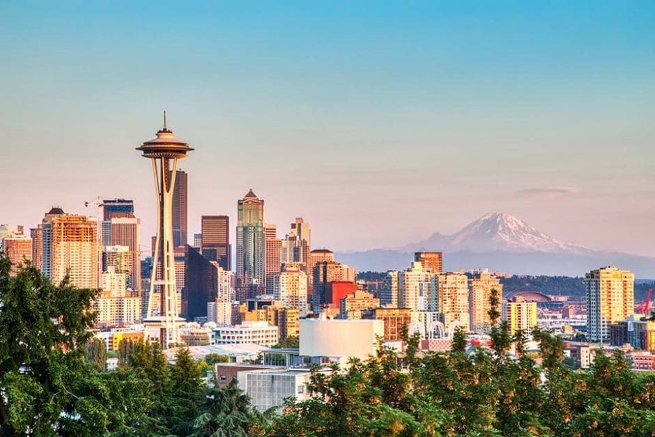 Picture of Seattle skyline at sunset, host city of the 2024 Minority Business Economic Forum. 