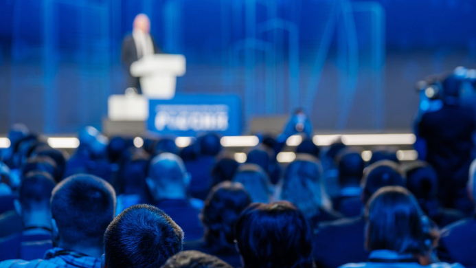 Blurred,Audience,Listening,To,A,Speaker,At,A,Professional,Conference Blurred,Audience,Listening,To,A,Speaker,At,A,Professional,Conference